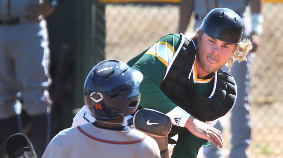 Seth Beckstead, CAC catcher, with the tag in 2020 game. He tripled and homered in game one in Yuma Saturday.